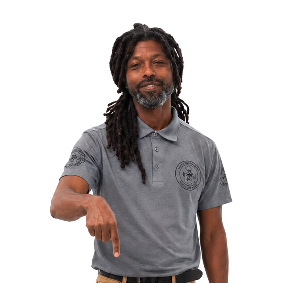 Carlos Hamilton — Owner, Hamilton Helping Hands LLC (Decatur, GA) Carlos Hamilton, owner of Hamilton Helping Hands LLC, pointing down — Decatur GA handyman and renovation expert serving the Greater Atlanta Metro